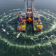 Foto einer Offshore-Windkraftanlage auf dem Meer